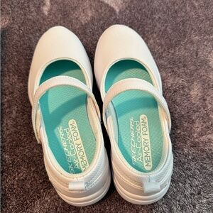 Brand new in box, girls uniform Sketchers shoes size 1